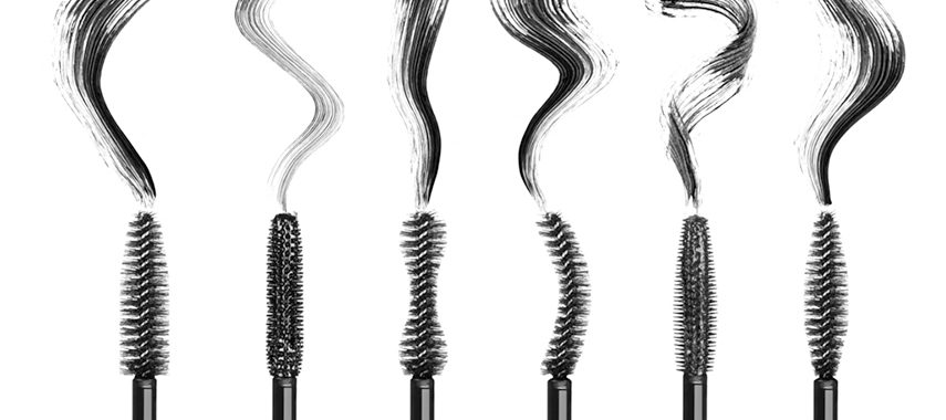 A set of different mascara brush types in a row.