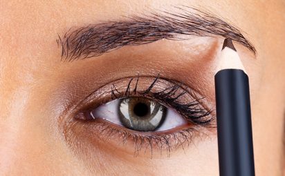 You can use a brow pencil to fill in sparse areas of your eyebrows