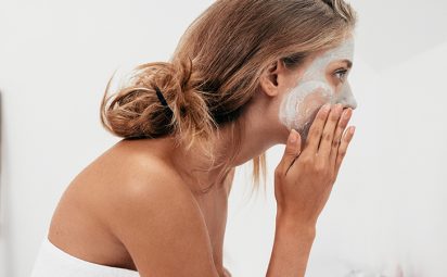 Regularly applying a face mask can help with oily skin