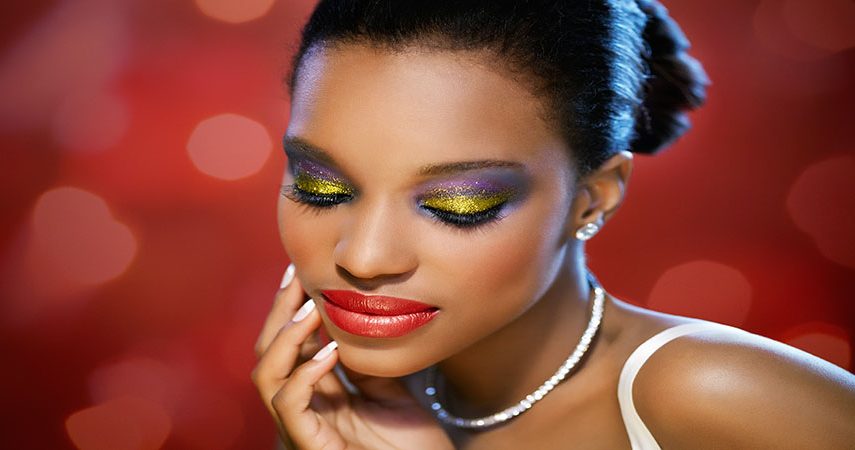 Woman wearing glitter makeup.