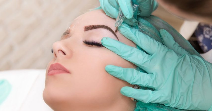 What is microblading? A woman geting microblading treatment done.