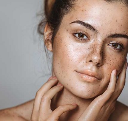 A girl with natural, dewy makeup on