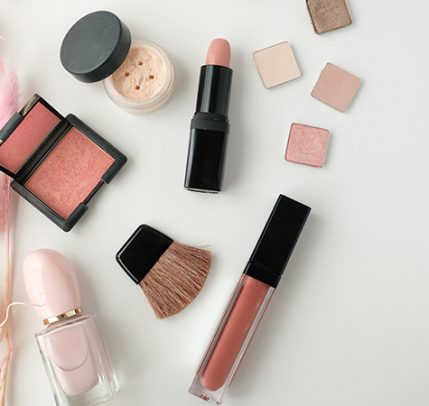 Organic Makeup: What Are the Benefits? natural tone makeup on white background with pink florals