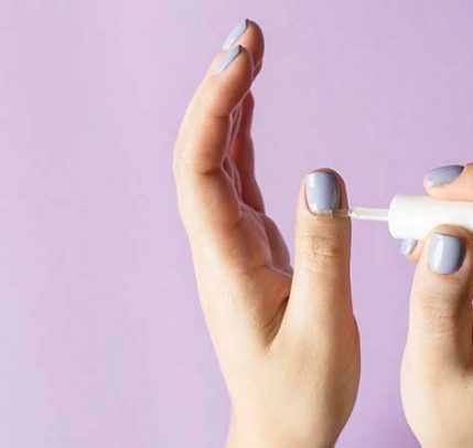How to Strengthen Nails Applying cuticle oil to strengthen nails
