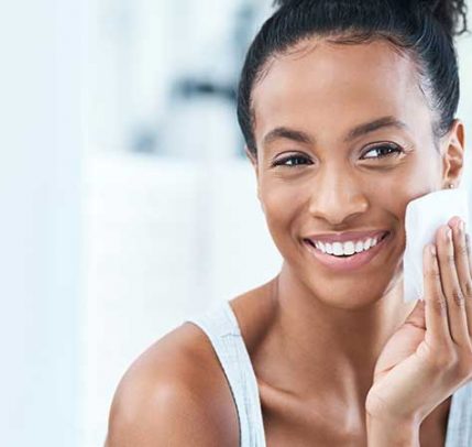 skincare-tips A woman cleansing her face