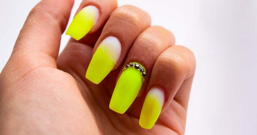 Yellow, acrylic nails.